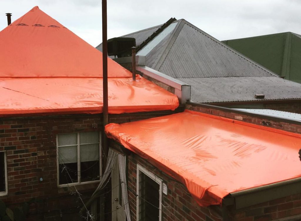 Next Level Restoration Roof wrapping